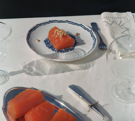 Kabak Tatlisi, seen here on the Lotus dessert plate, with the Palmyra Sky tablecloth and napkin set.