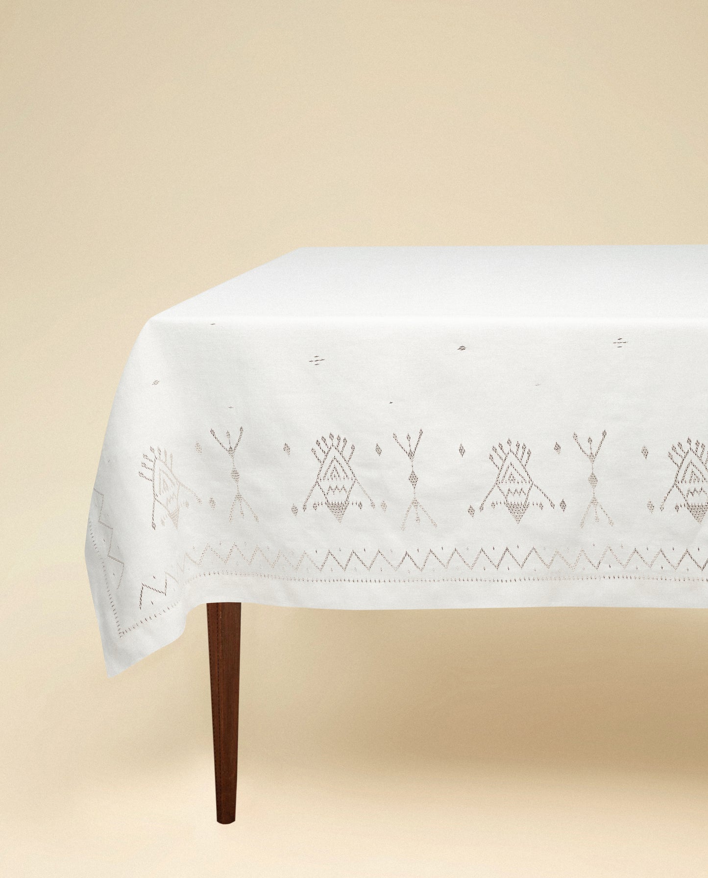 The Palmyra Sky Tablecloth, silver on white linen.