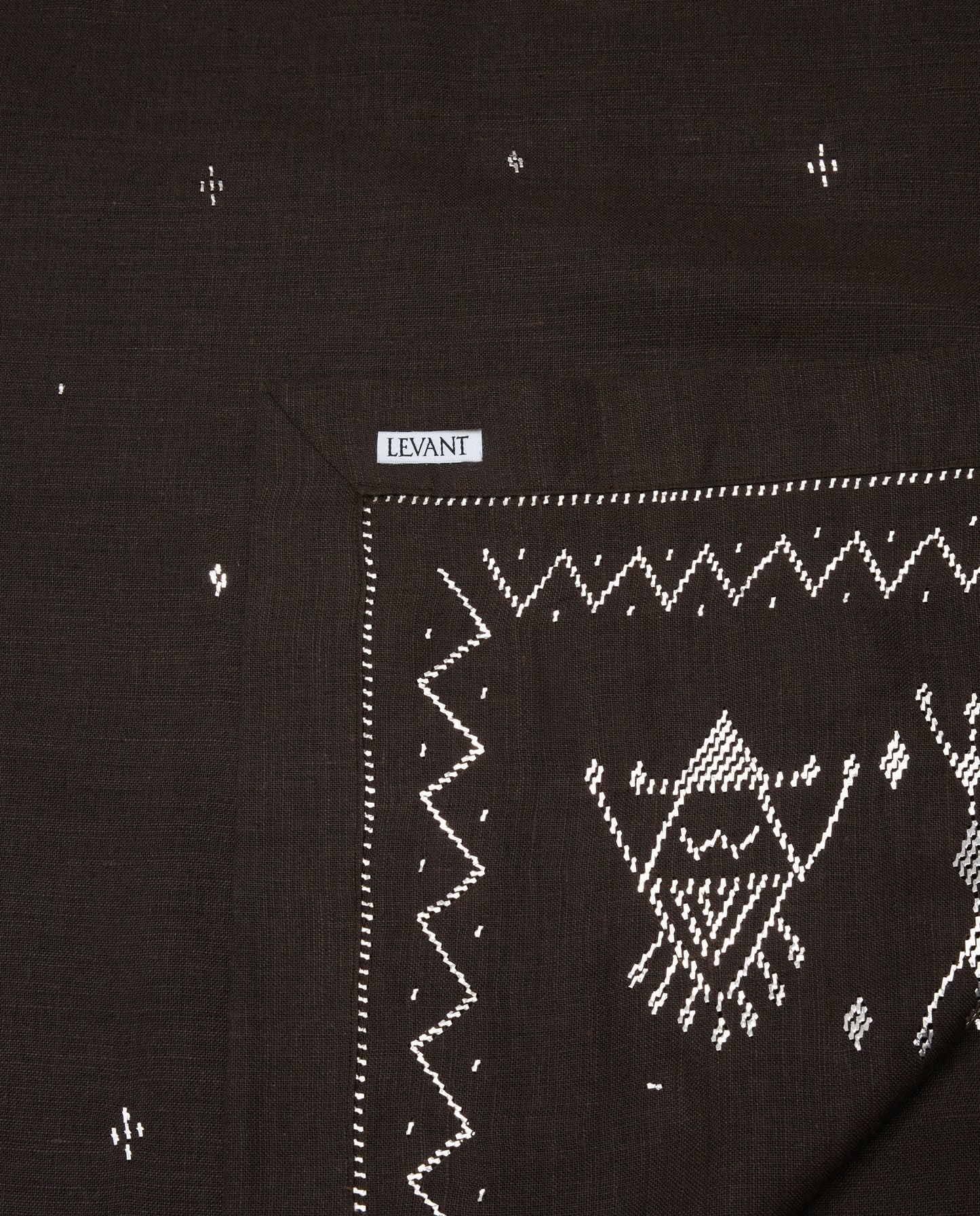 Palmyra Sky Tablecloth with Bedouin motif detail.