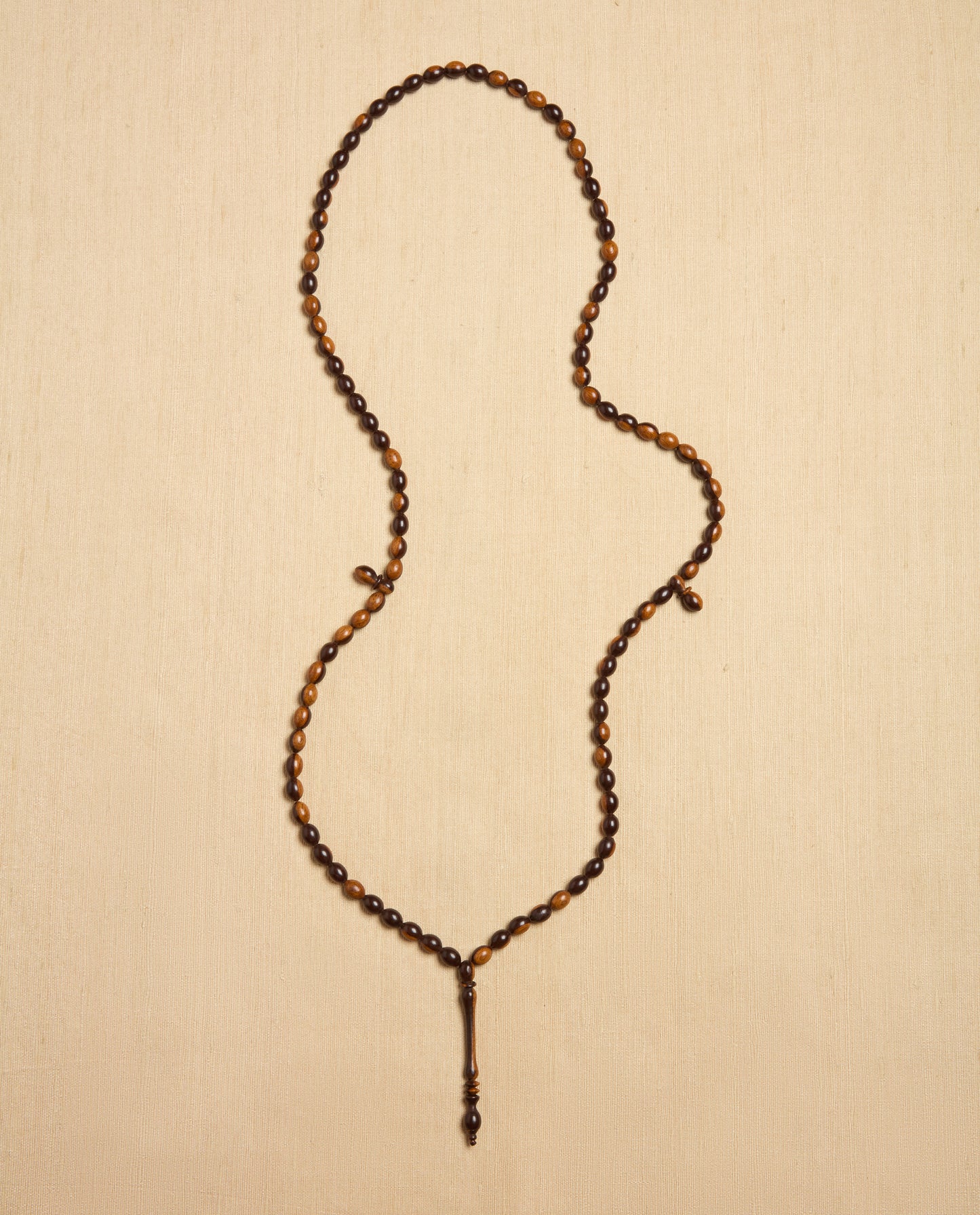 The Ancora Necklace in Mixed Brown Palm Wood