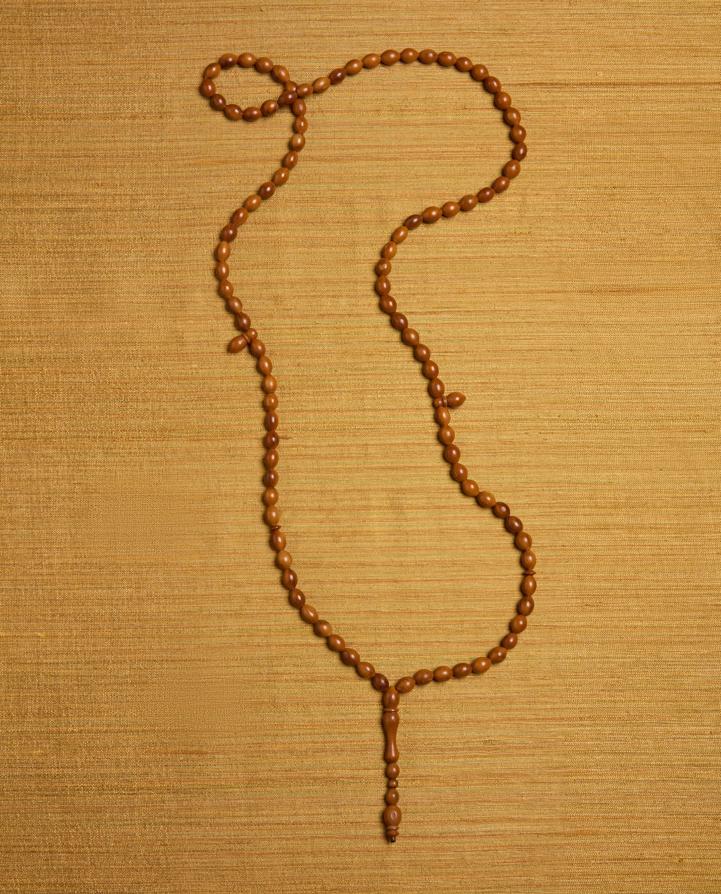 The Ancora Necklace in Palm Wood