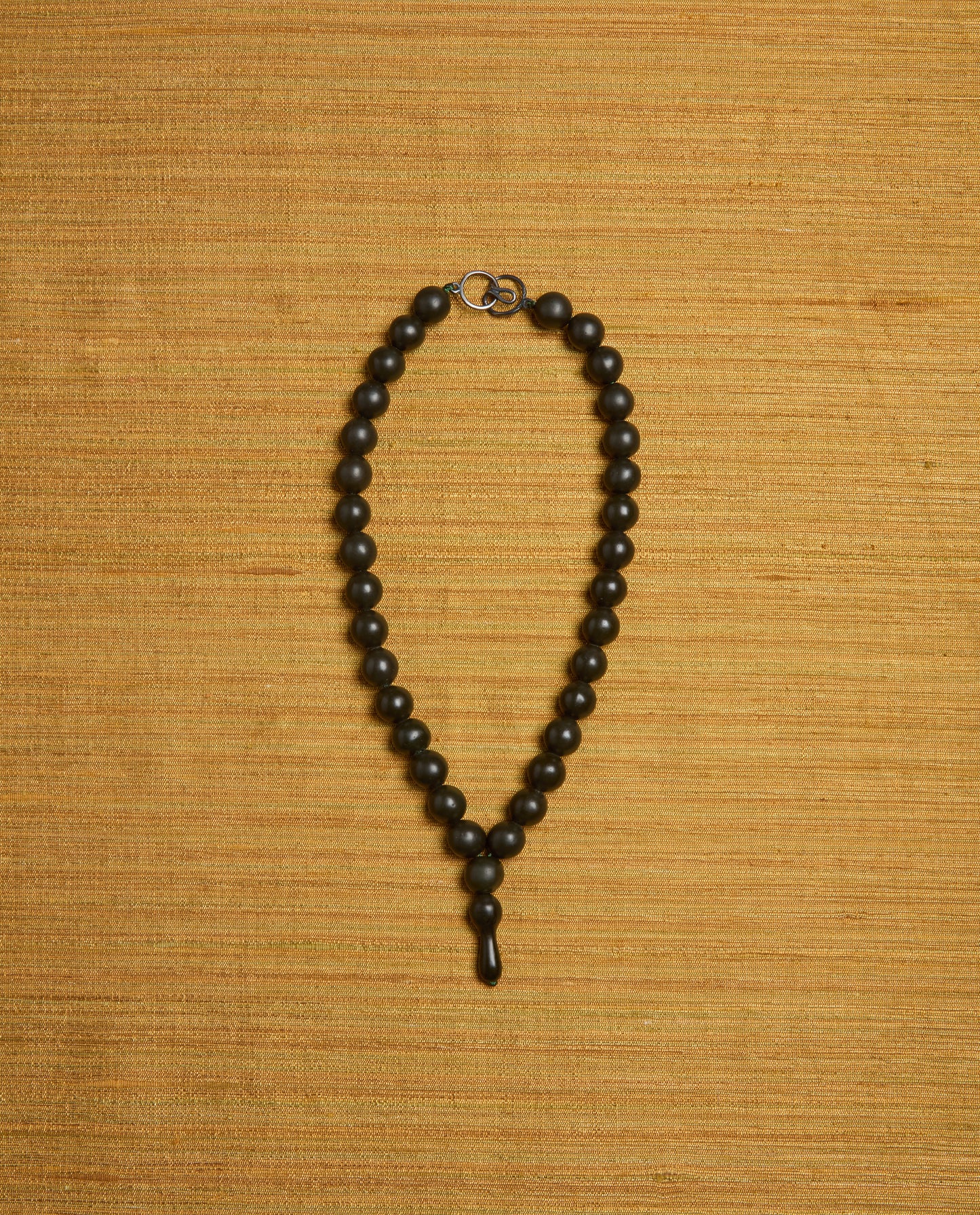 The Ancora Necklace in Black Amber