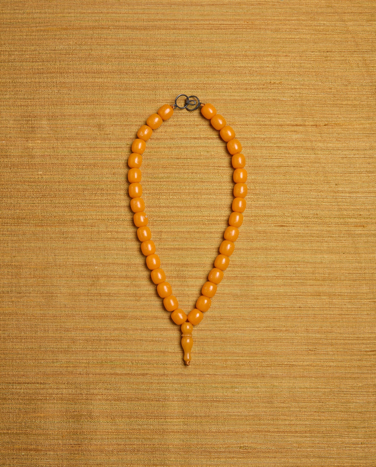 The Ancora Necklace in Orange Resin
