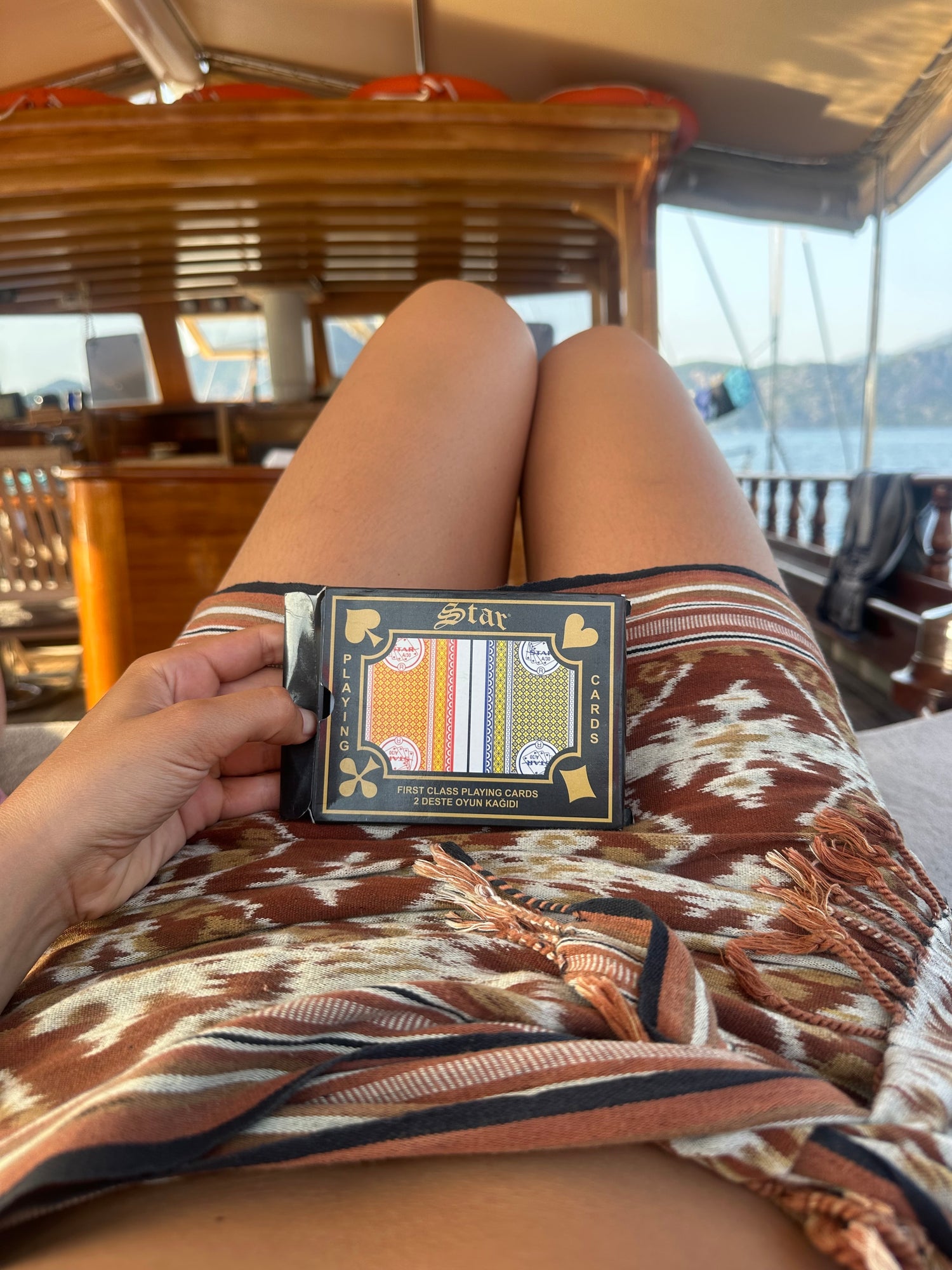 Cards and good company are a must on a blue voyage trip. 